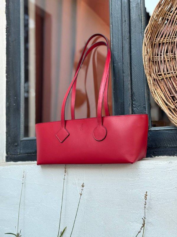 The Black Quail red leather bag product shot